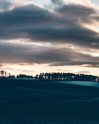 Scenic view of silhouette landscape against sky