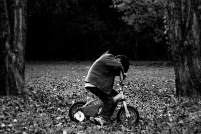 Close-up of boy on bicycle