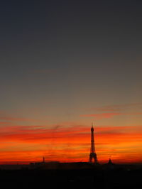 Silhouette of tower during sunset
