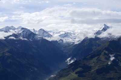 Scenic view of snowcapped mountains against sky