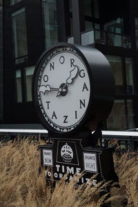 Close-up of clock on wall