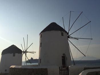 Traditional windmill against clear sky