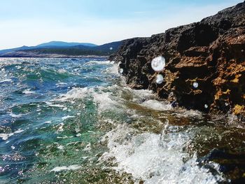 Scenic view of sea against clear sky