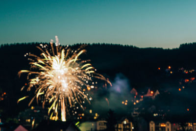 Firework display at night