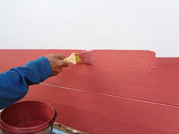 Man working on wall