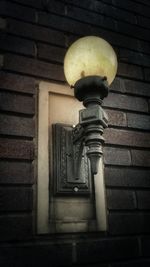 Low angle view of illuminated lamp