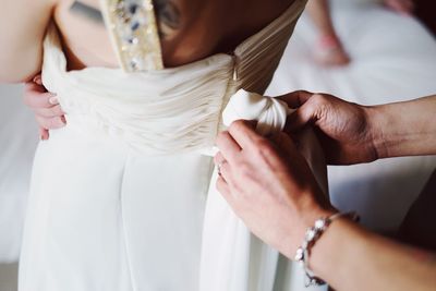 Rear view mid section of a bride