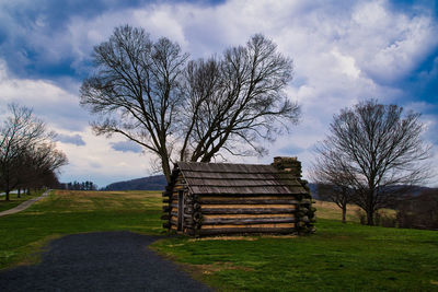 House on field against sky