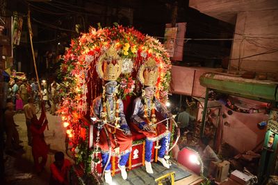 Illuminated market stall for sale at night