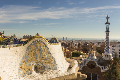 Panoramic view of buildings in city against sky