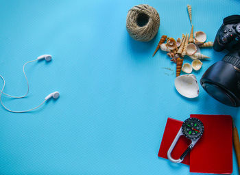 Directly above shot of equipment on blue background