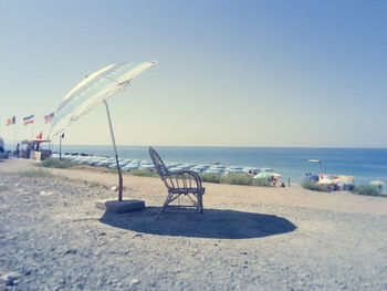 Scenic view of beach against clear sky