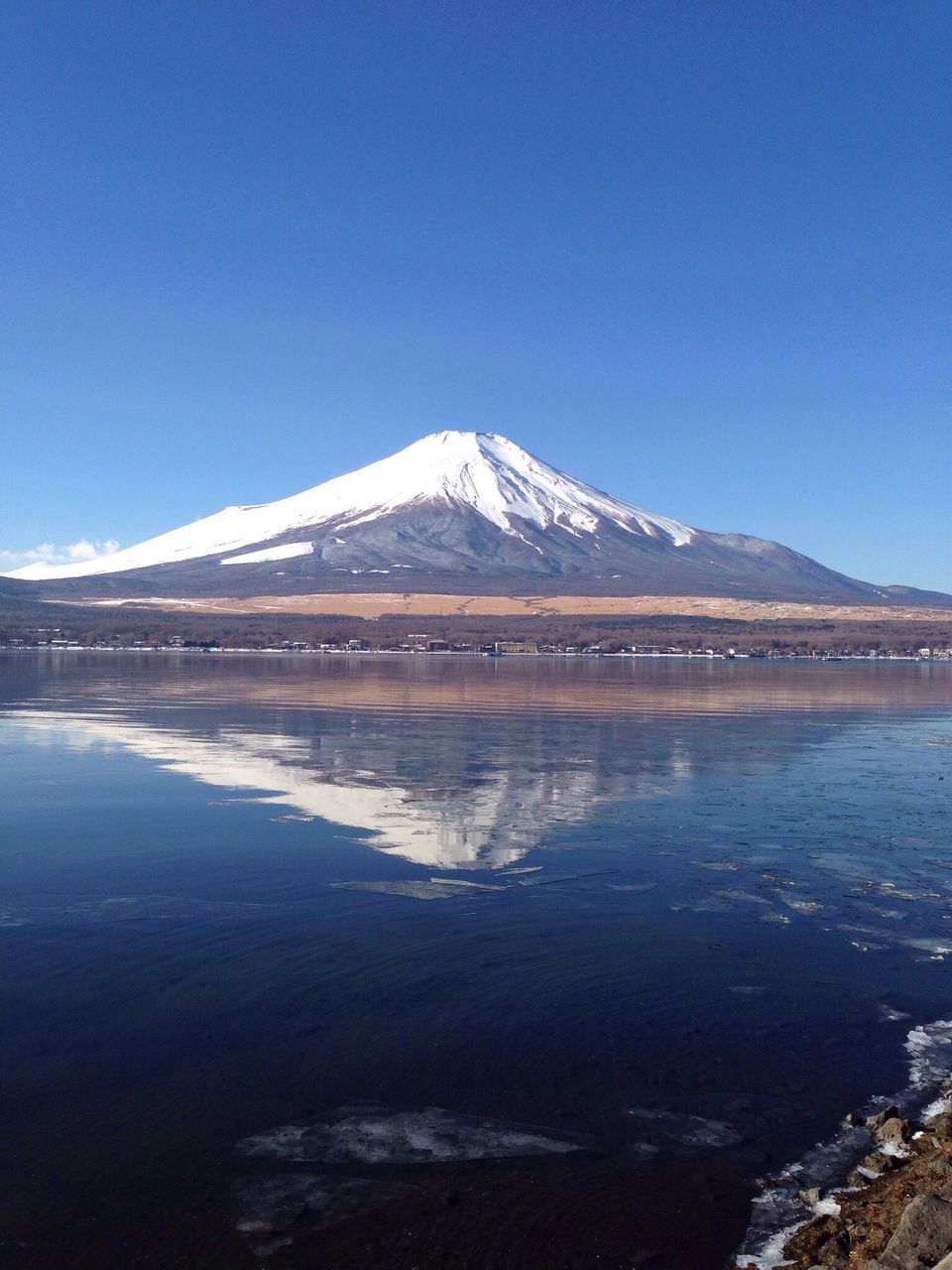 snow, winter, cold temperature, mountain, tranquil scene, tranquility, clear sky, scenics, season, water, blue, beauty in nature, lake, mountain range, snowcapped mountain, copy space, nature, frozen, landscape, waterfront