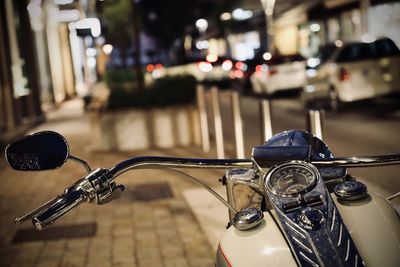 Close-up of bicycle parked on street