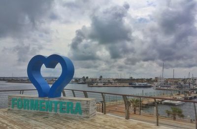 Heart shape made from ship in sea against sky