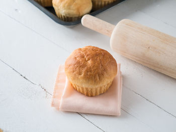 High angle view of bread on cutting board