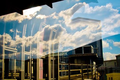 Low angle view of buildings against sky during sunset