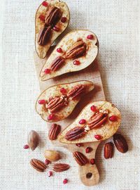 High angle view of fruits on cutting board