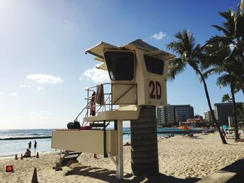 Lifeguard hut on shore at waikiki