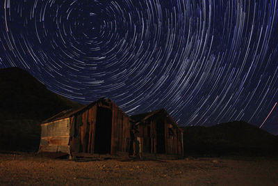 Full frame shot of messy field against sky at night