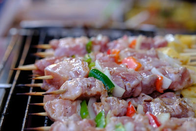 Close-up of meat on barbecue