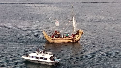 High angle view of sailboat sailing in sea