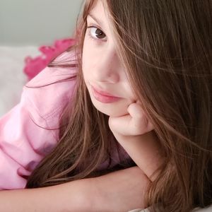 Close-up portrait of girl at home