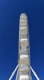 Low angle view of building against blue sky