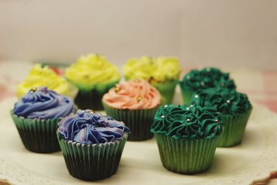 Close-up of colorful cupcakes on table