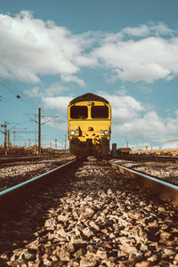 Railroad track against sky