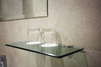 A pair of glass in toilet.