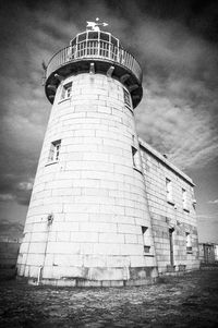 Low angle view of lighthouse against sky