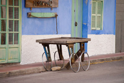 Bicycle on street against old building