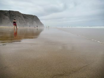 Scenic view of beach against sky