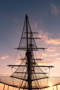 Low angle view of sailboat against sky during sunset