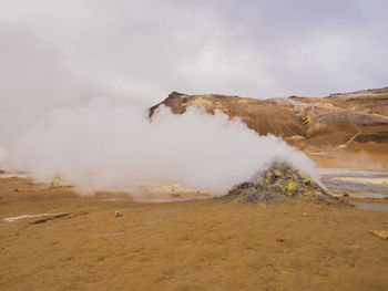 Scenic view of steam over landscape