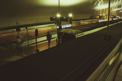 Illuminated train at night