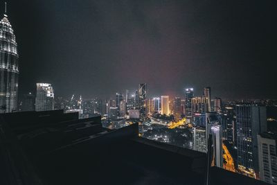 High angle view illuminated cityscape at night