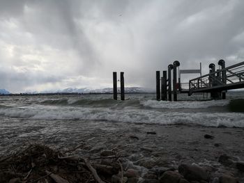 Scenic view of sea against sky during winter