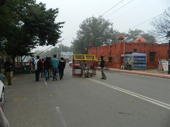 People at market stall