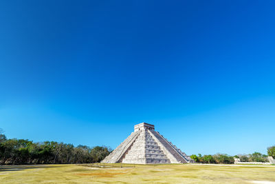 View of historical building against clear blue sky