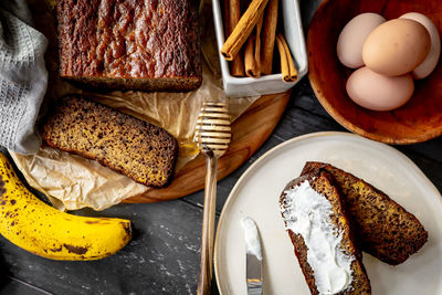 Home made banana bread rustic flat lay fresh ingredients honey eggs