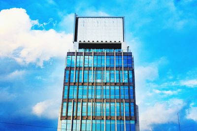 Low angle view of modern building against sky