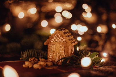 Christmas academia vintage romantic table with fir, candles, mulled wine, red decorations