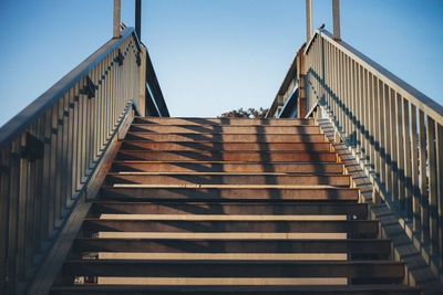 Low angle view of staircase against clear sky