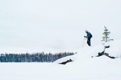 Low angle view of woman jumping