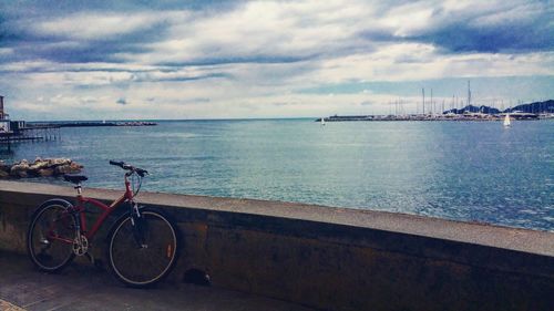 Scenic view of sea against cloudy sky