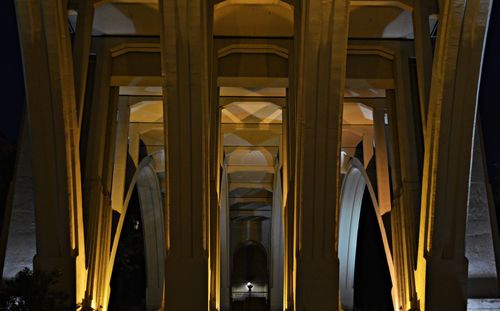 Low angle view of illuminated building at night