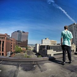 Woman standing on city street