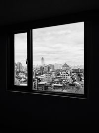 Cityscape seen through window